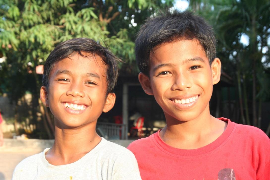 Kids smiling at the camera in Cambodia