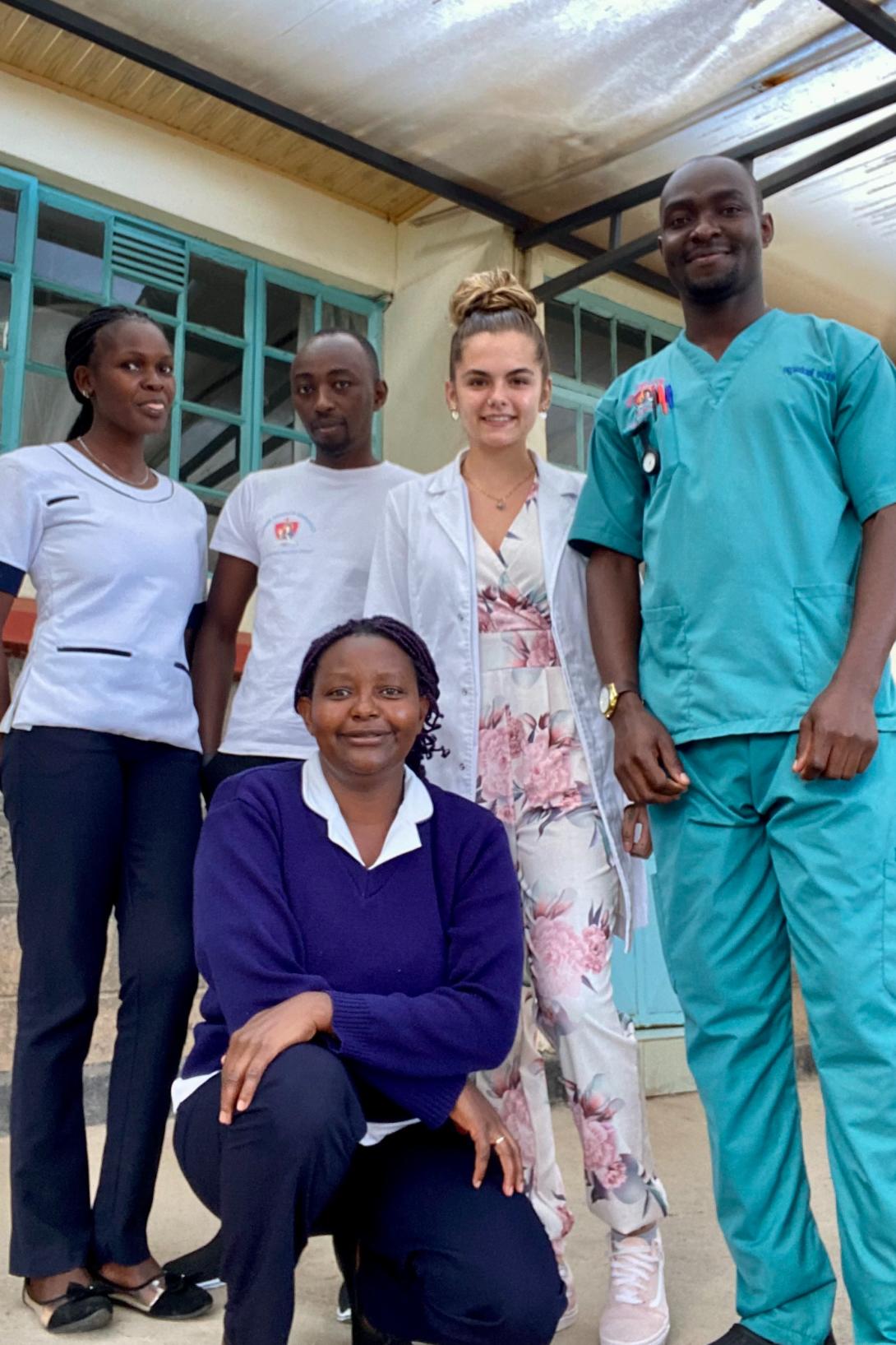 Medical intern with staff in Kenya