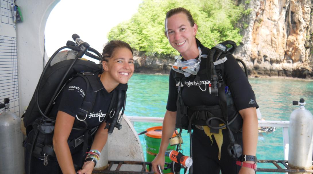 Diving volunteers in Thailand on a boat