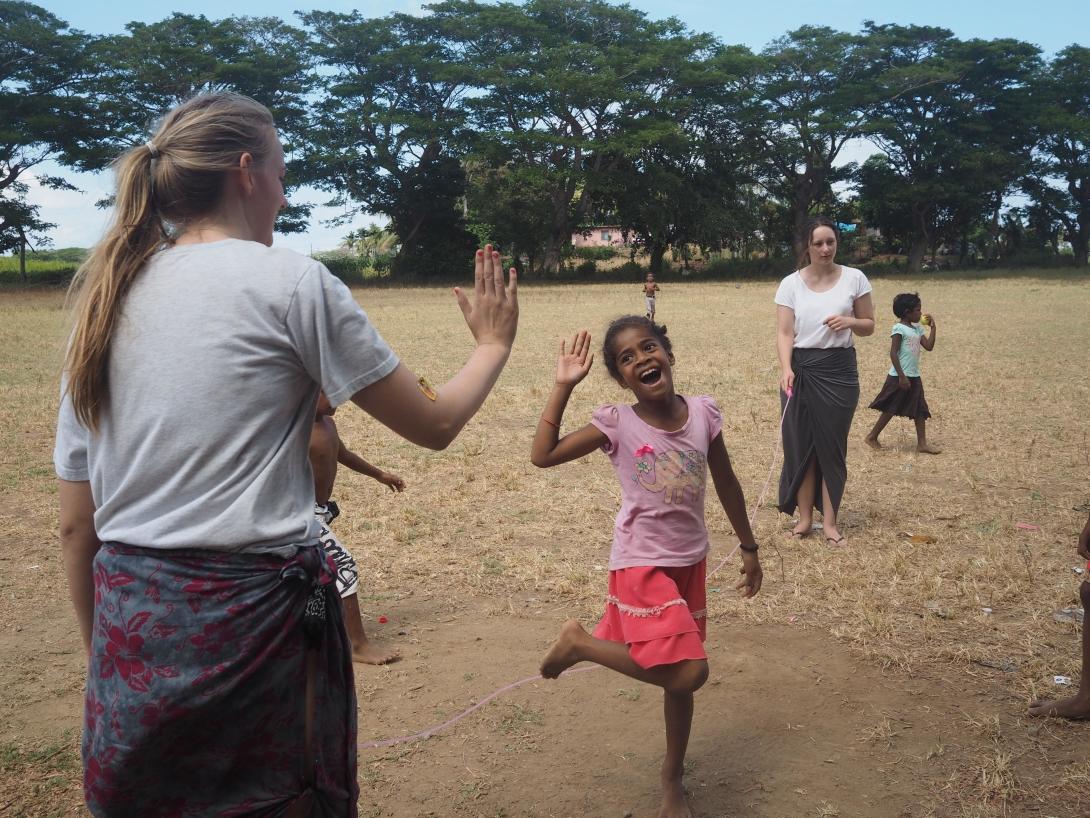 Projects Abroad High School Special volunteers play games with children at their Care and Community placement in Fiji.
