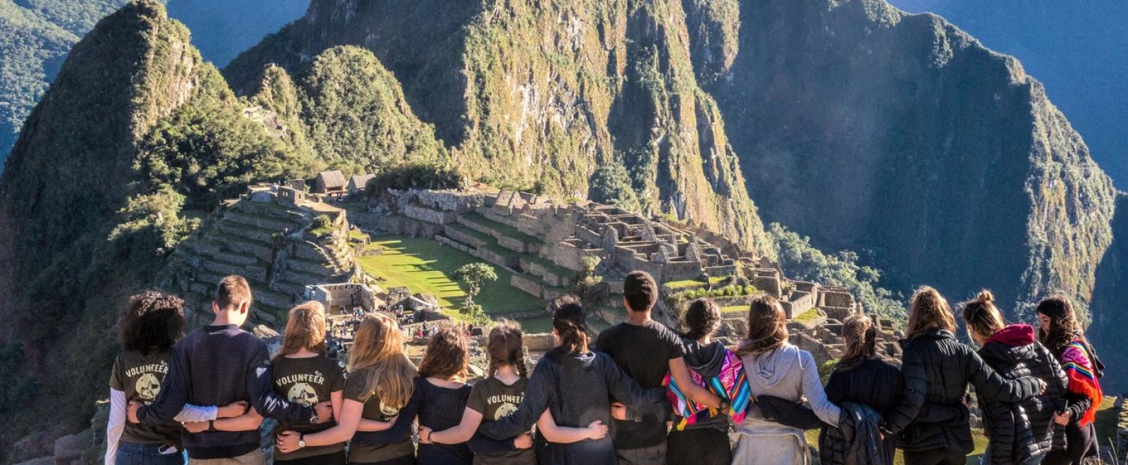 A group on a volunteer trip with Projects Abroad visits Machu Picchu over a weekend.