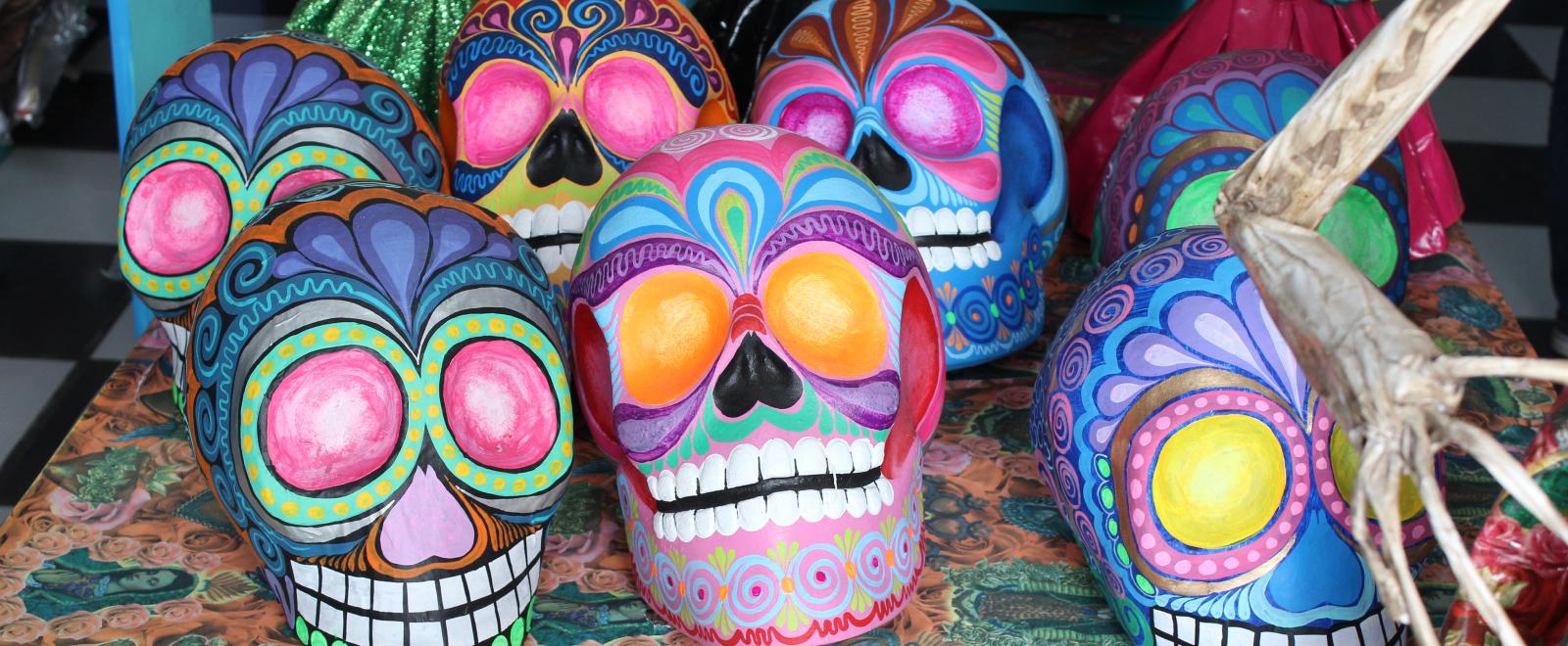 A sugar skull hand painted and on sale at a market in Mexico.