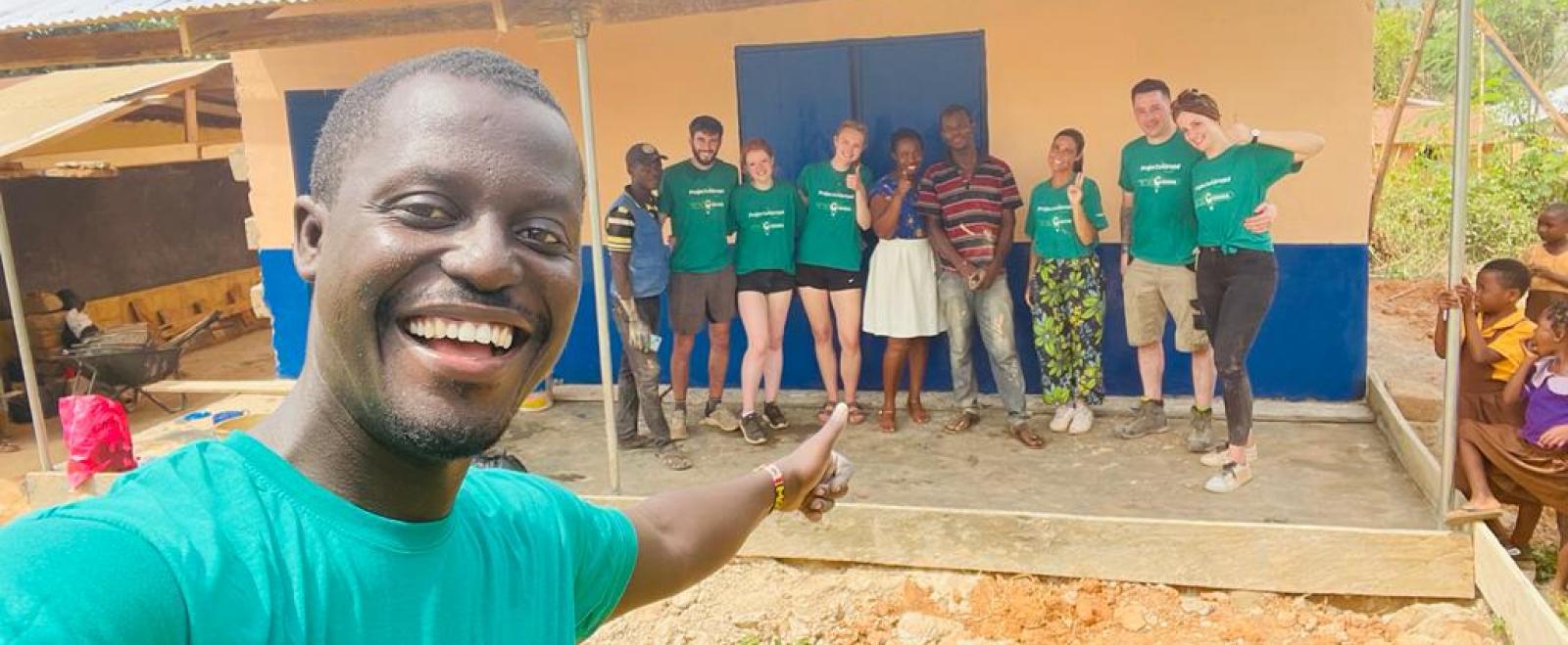 Volunteers outside the newly built classroom in Ghana