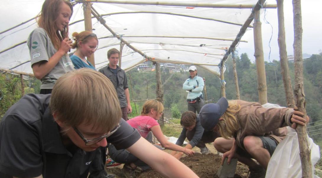 Conservation volunteers doing manual work in Nepal