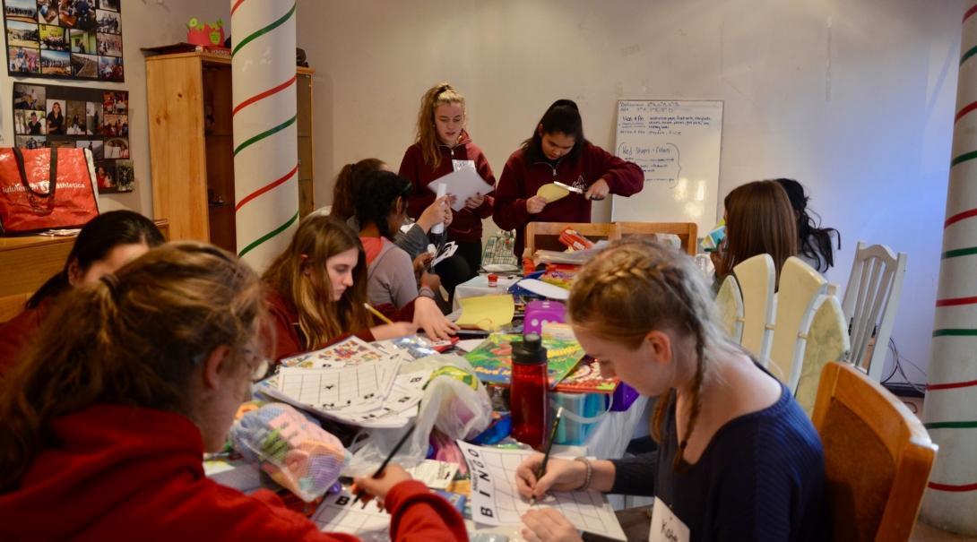 Projects Abroad volunteers work together to create educational materials to help young children learn in Peru. 