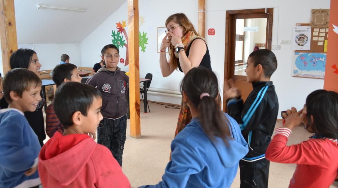 Children participate in a drama activity led by a Projects Abroad Childcare volunteer at a care centre in Romania. 