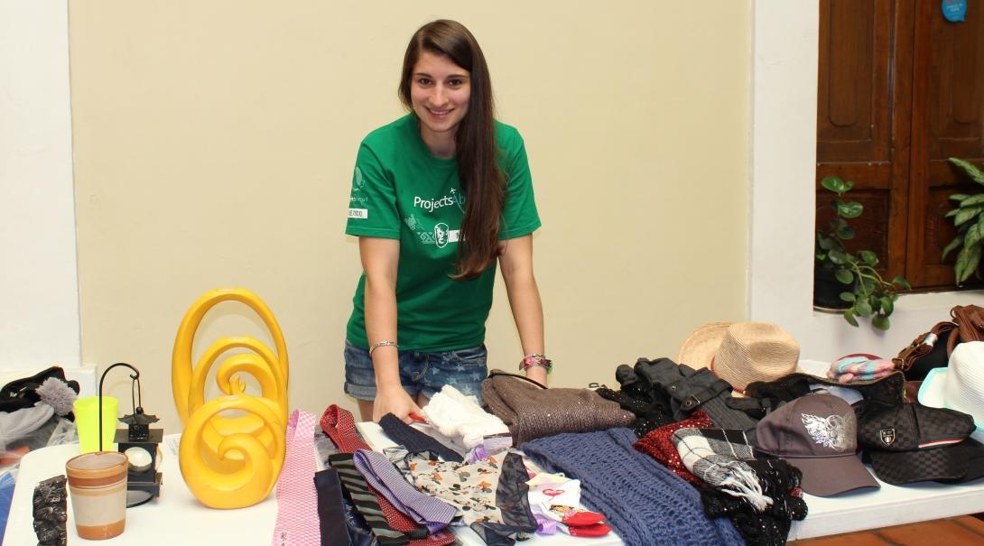 A Projects Abroad Business intern spend time at a beneficiary's small stall as part of her internship in Mexico. 