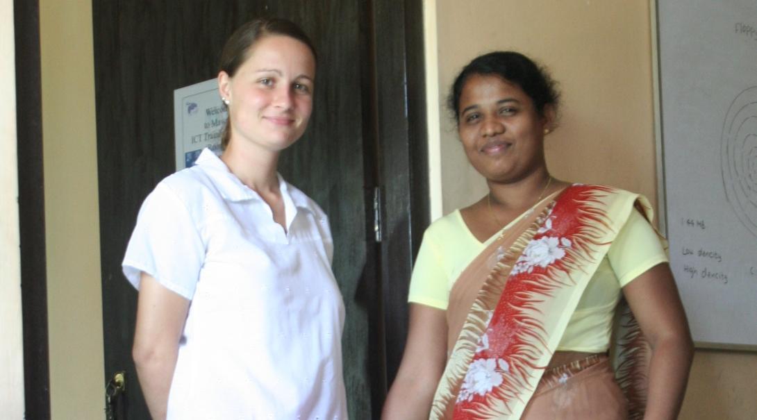 A Projects Abroad student on the business internship in Sri Lanka takes a photo with her supervisor. 