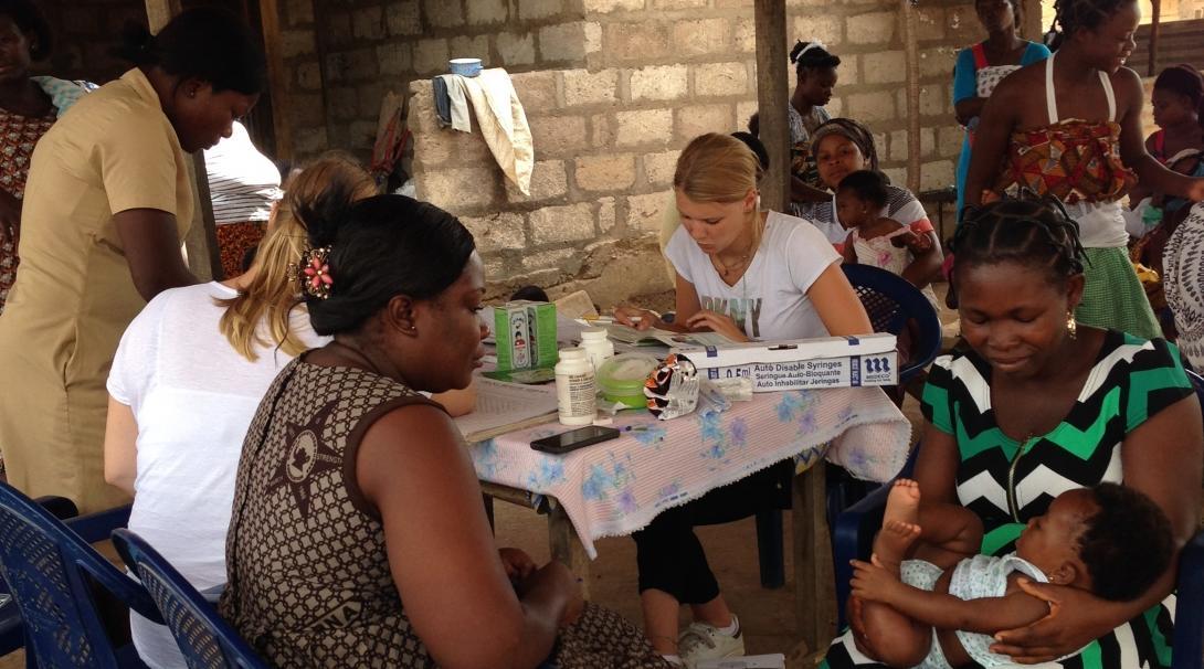 Local women attend a community outreach and receive treatment from Projects Abroad Midwifery and other medical interns in Ghana.