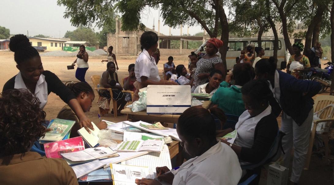 Local nurses supervise a group of students doing Nursing internships in Ghana during a medical outreach. 