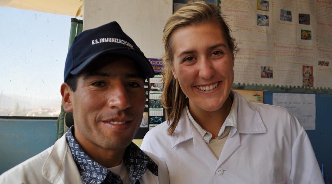 Projects Abroad intern takes a photo with a local doctor during her nursing internship in Peru.