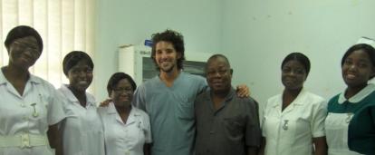 An intern on a Dentistry Project in Ghana with local medical staff at a clinic.