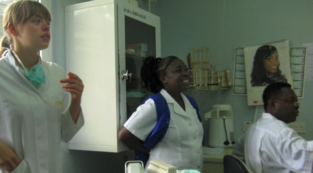 Two local dentists involve a Projects Abroad dental intern in one of their meetings at a hospital in Ghana.