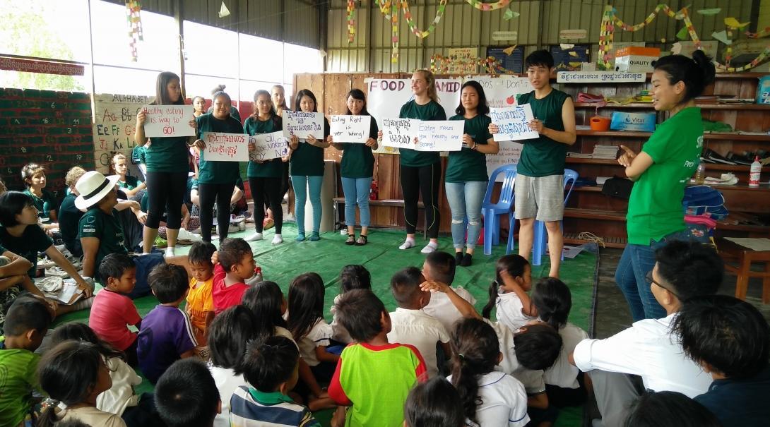 Interns run a healthy eating campaign as part of their Public Health work for teenagers in Cambodia.