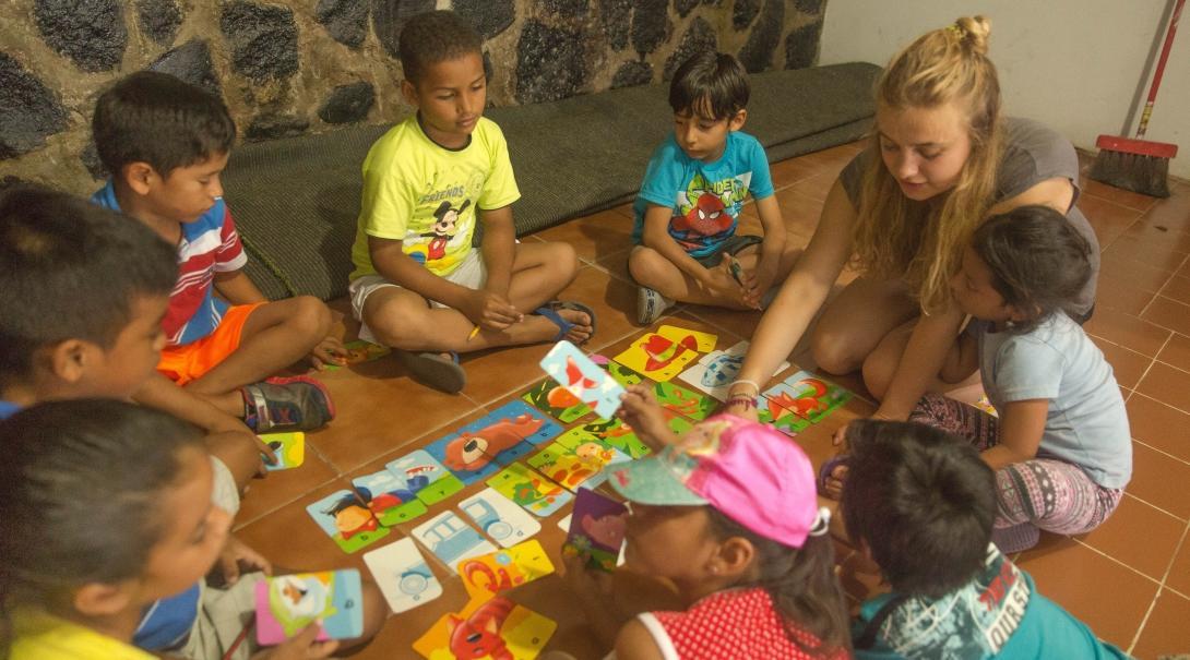 Flashcards are used to teach the children English words at one of our volunteer teaching placements in Ecuador 