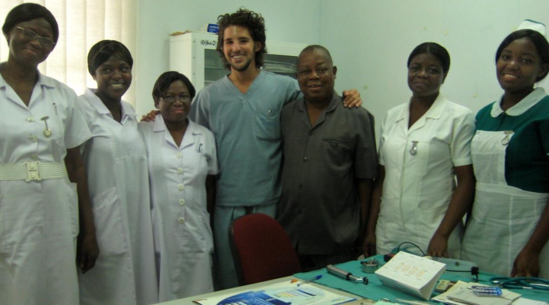 A few interns pose with local doctors and nurses at the end of their pharmacy internship in Ghana with Projects Abroad.
