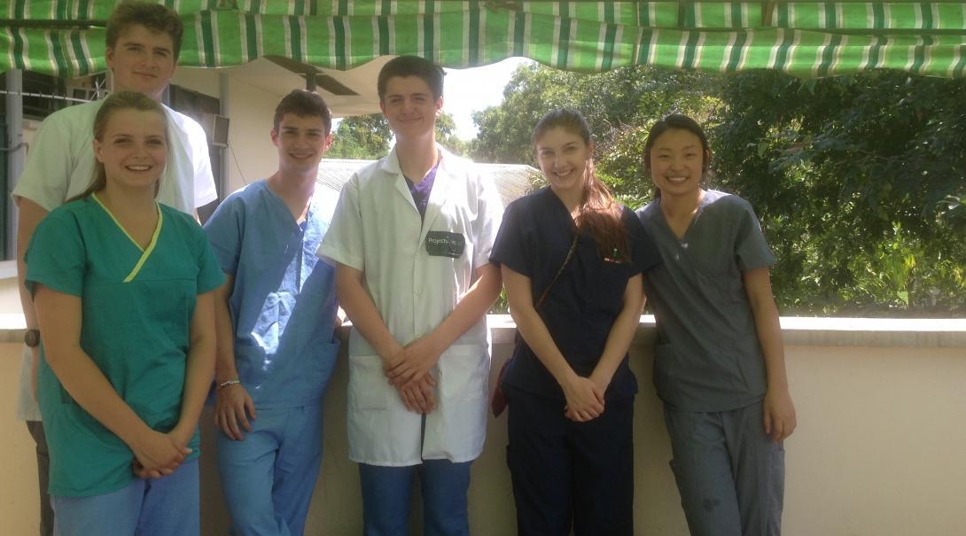 Medicine interns with Projects Abroad take a picture at the hospital during their pharmacy internship in Ghana.
