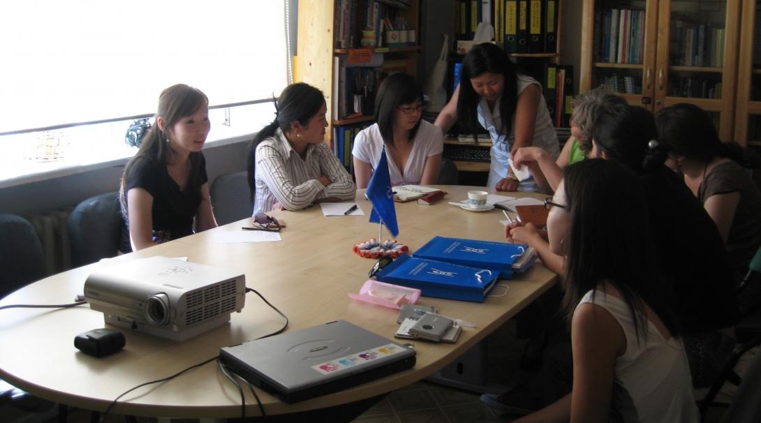 Local cases are discussed in a meeting as part of a Human Rights internship in Mongolia.