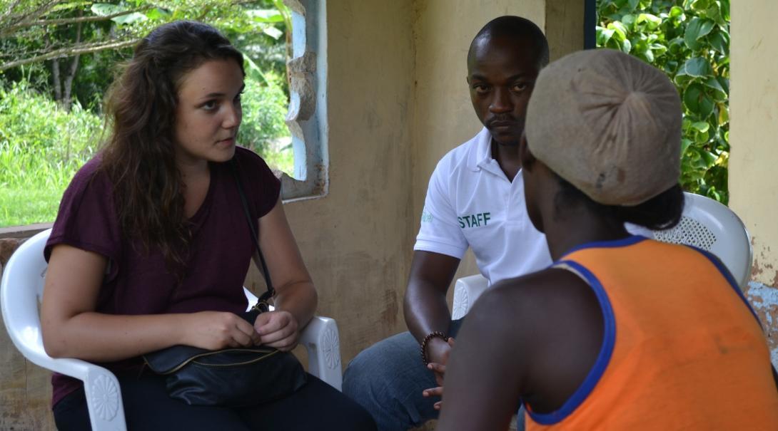 In Ghana, a speech therapy intern and local staff member chat to a patient at the placement location. 