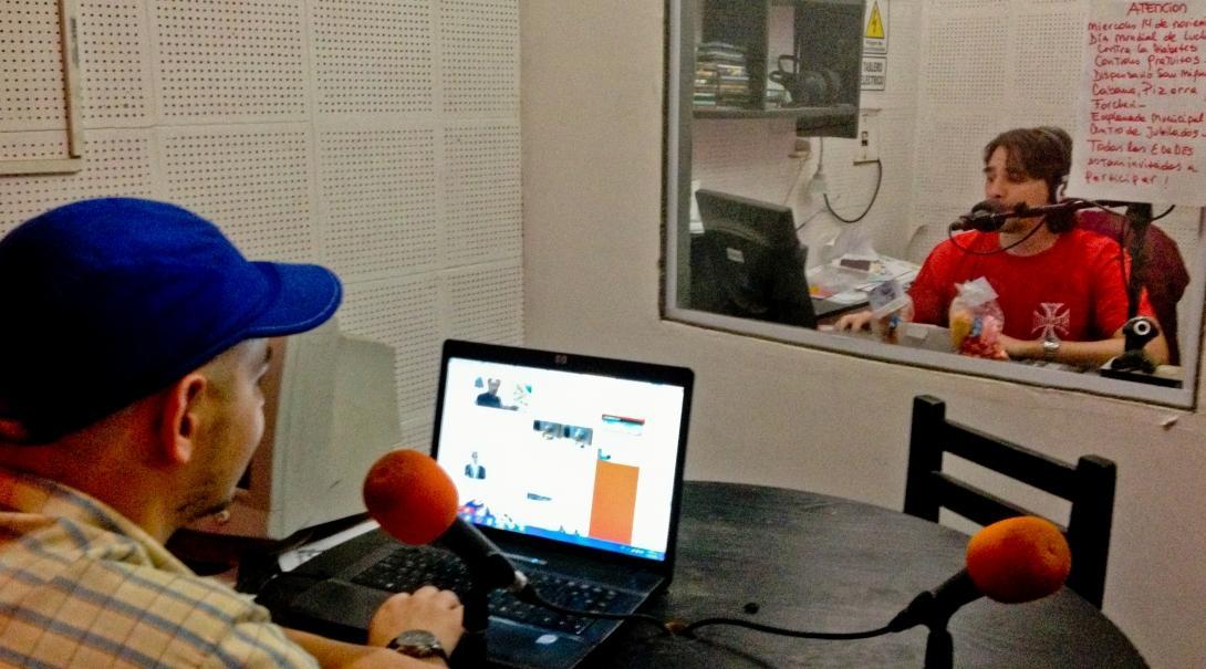 A radio journalism intern in Argentina at his placement 
