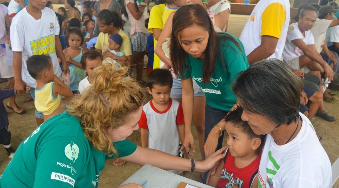Public Health intern talking to her patient during a community outreach.