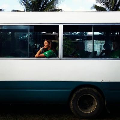 Volunteer travelling in a minibus