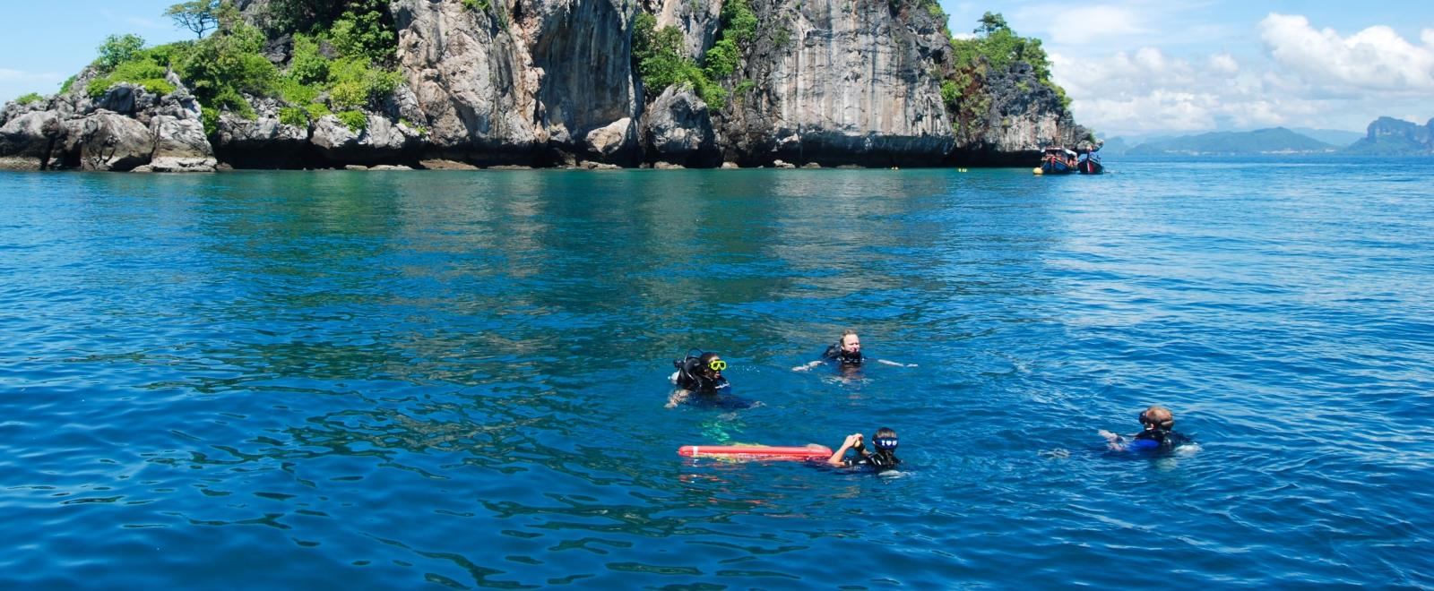 A group learns to dive on a Marine Conservation volunteer travel program in Thailand. 