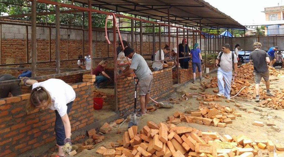Volunteers are building classrooms during the Building Project in Nepal
