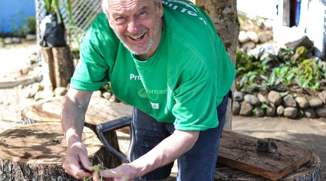 Retired volunteer helps build a vegetable garden in Fiji