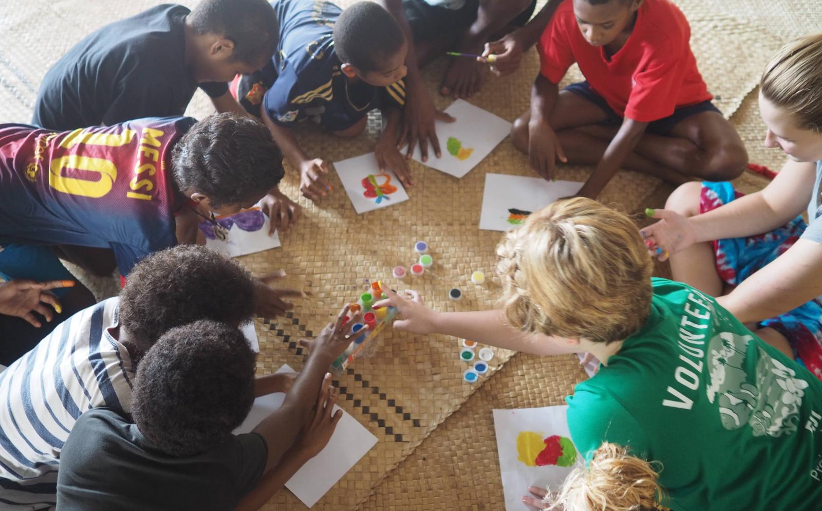 Projects Abroad volunteers play educational games with children from a nursery school rather than an orphanage abroad
