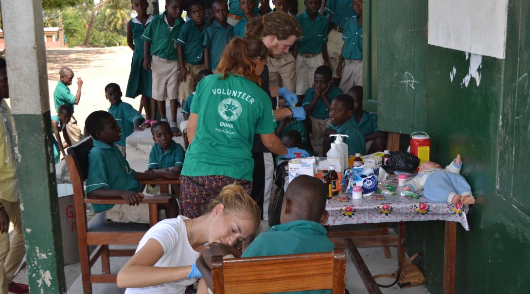 A group of nursing and medical volunteers run a medical outreach in Ghana during their internship with Projects Abroad.