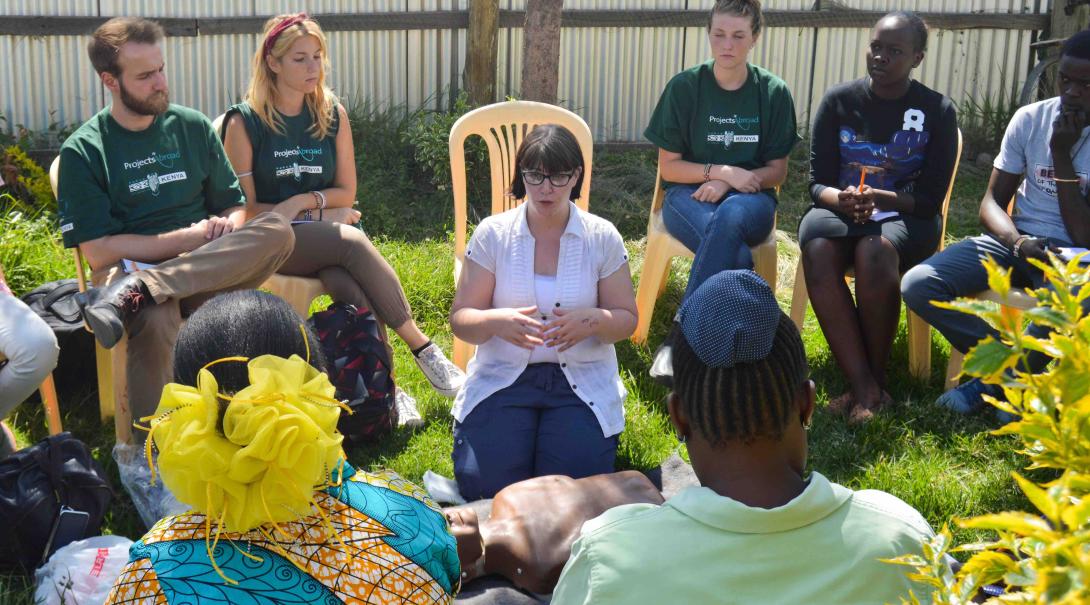 A group of Projects Abroad volunteers shadow a qualified therapist during a workshop in Kenya during their Occupational Therapy internship.