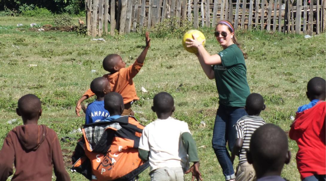 A teaching volunteers plays and practice physical activities with children in Kenya during her internship with Projects Abroad.