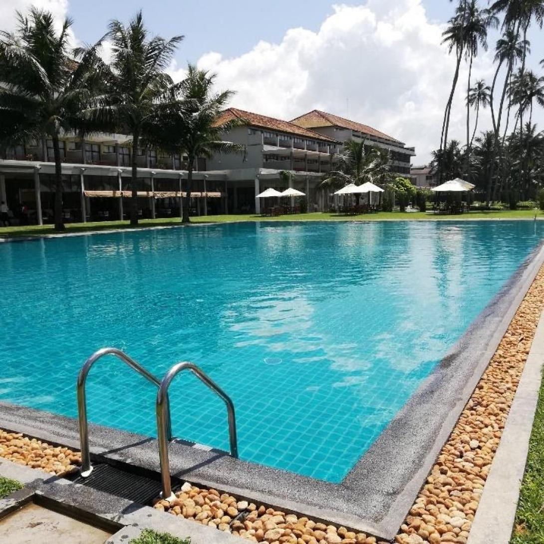 Relaxing at a pool in Sri Lanka