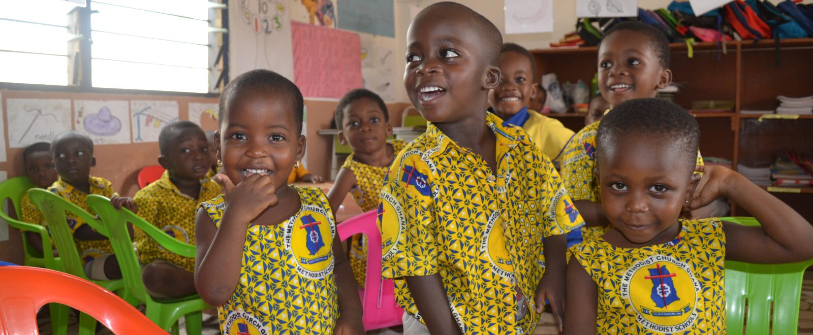 Volunteer with children in Ghana