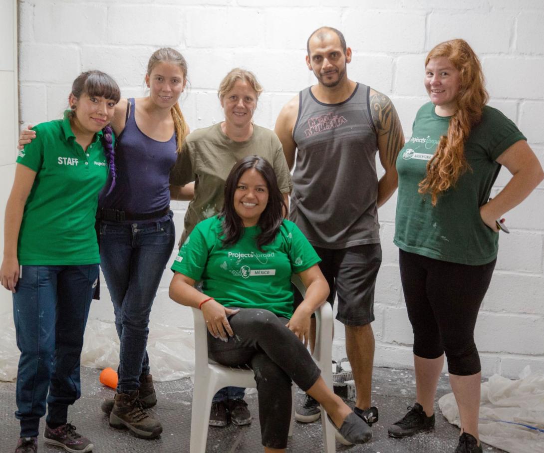 Volunteers and local Mexican staff work together for the community at a shelter for migrants.